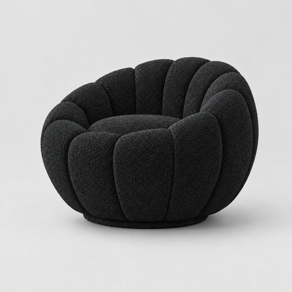 Black sculptural bouclé chair