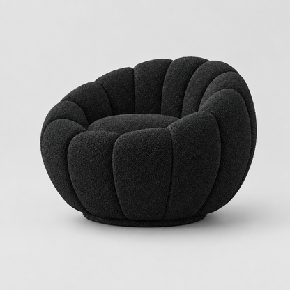 Black sculptural bouclé chair