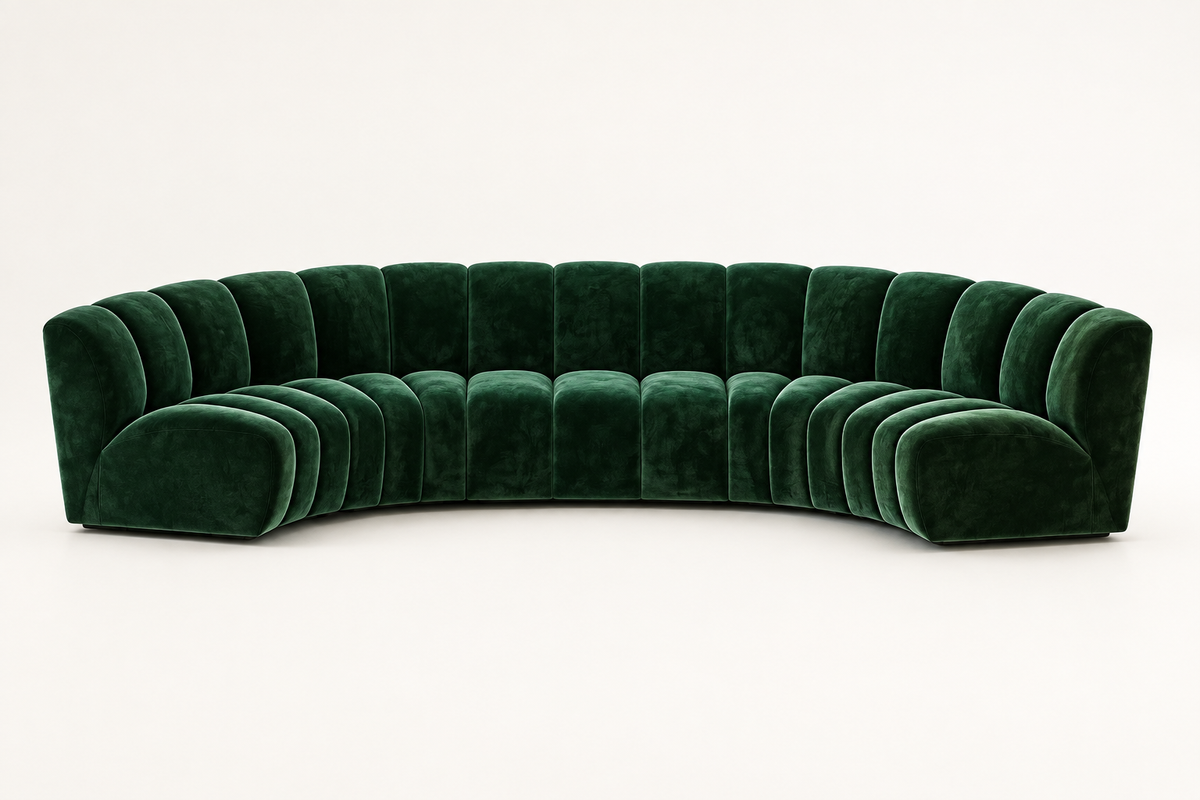 Large curved sofa in deep forest green