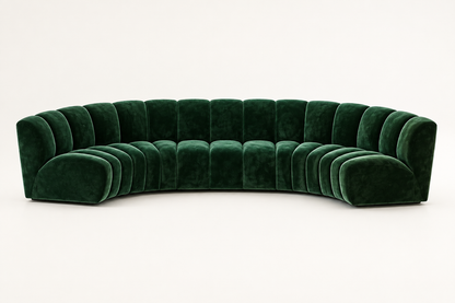 Large curved sofa in deep forest green